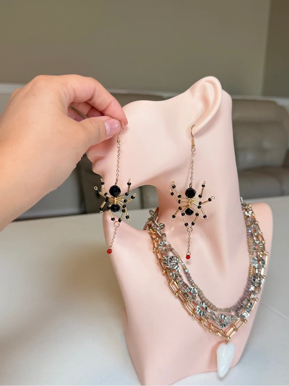 Gold and Black Beaded Spider Dangle Earrings